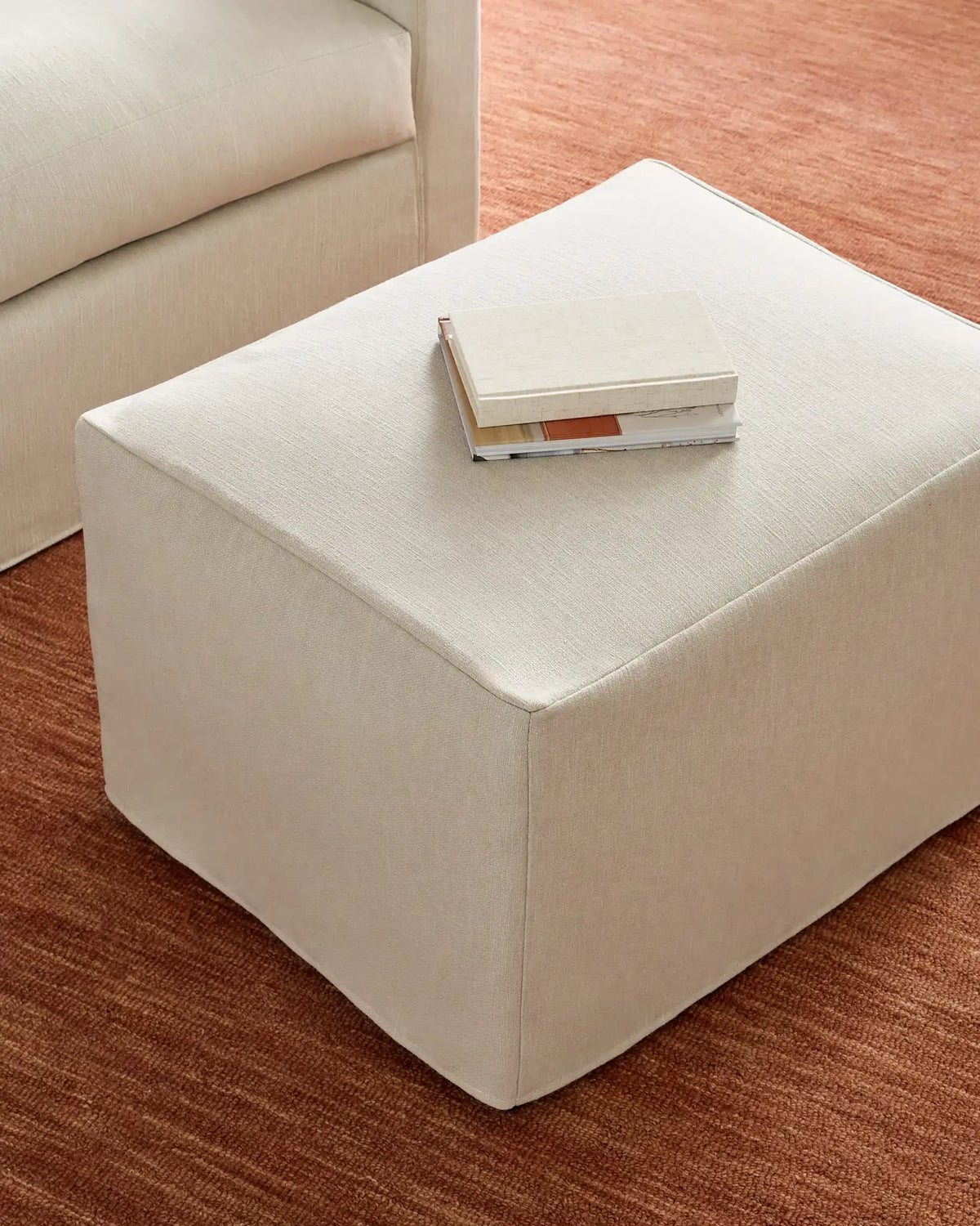 Ellery Slipcover Ottoman in Performance Linen