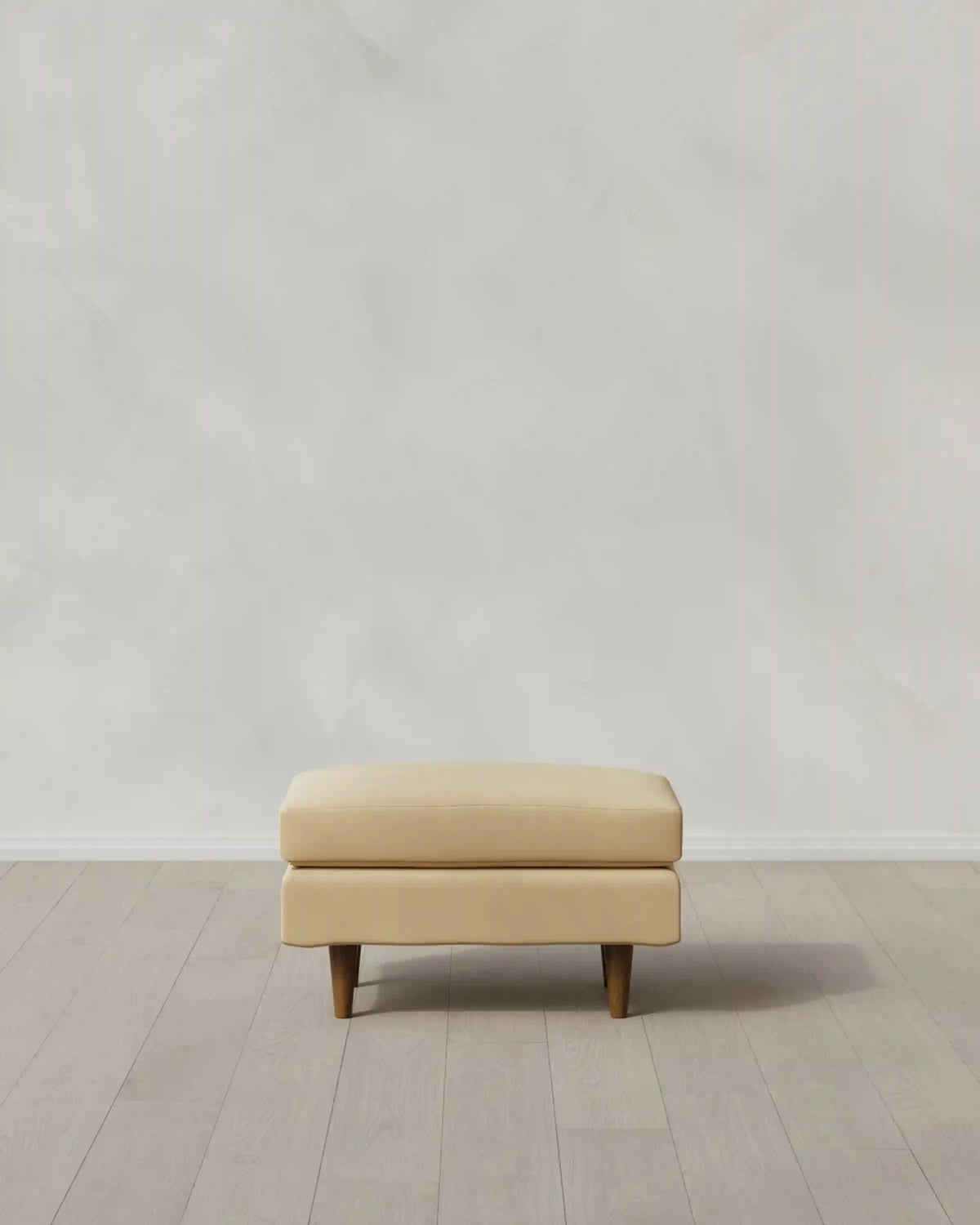 Atlas Midcentury Ottoman in Performance Velvet