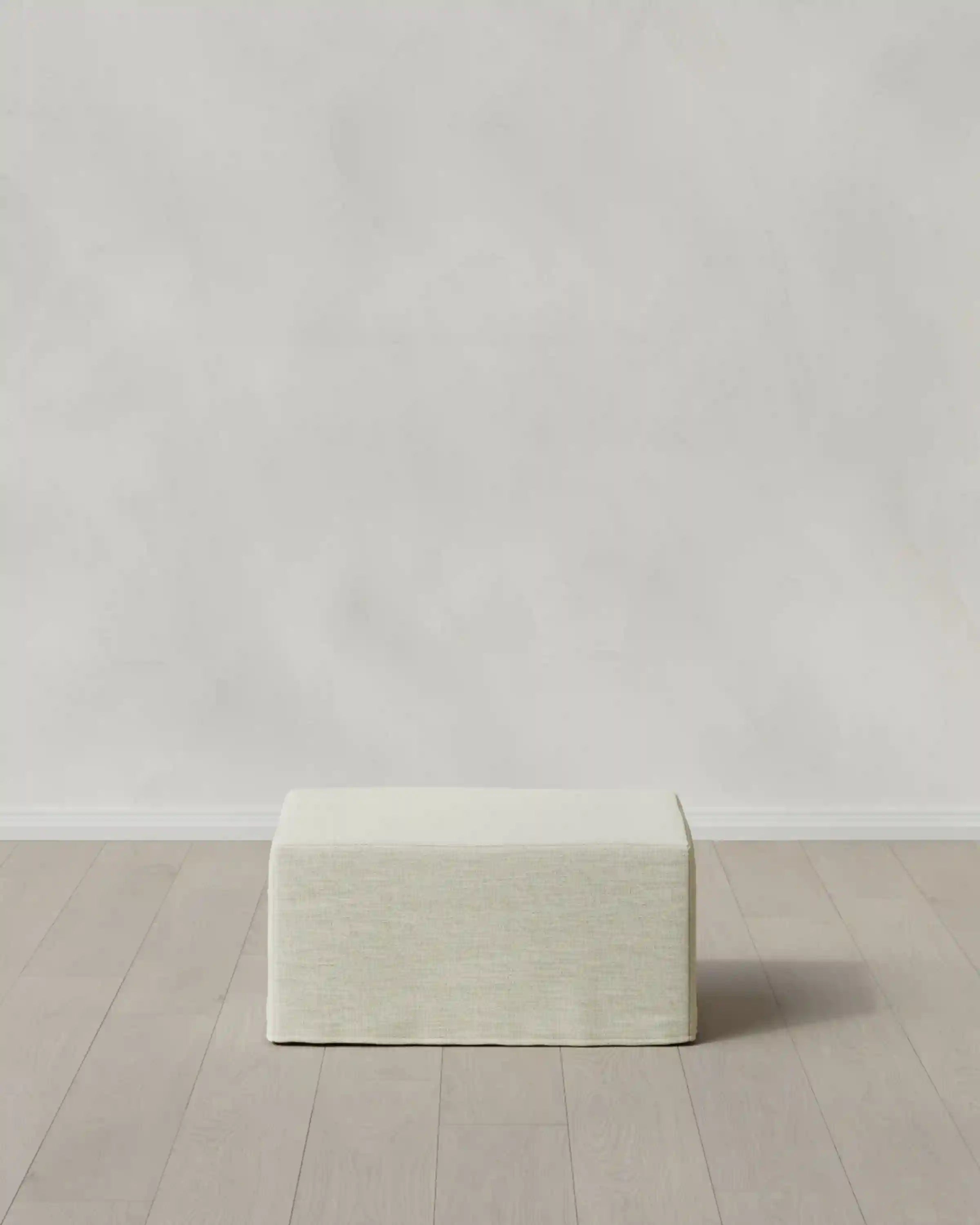 Ellery Slipcover Ottoman in Performance Linen