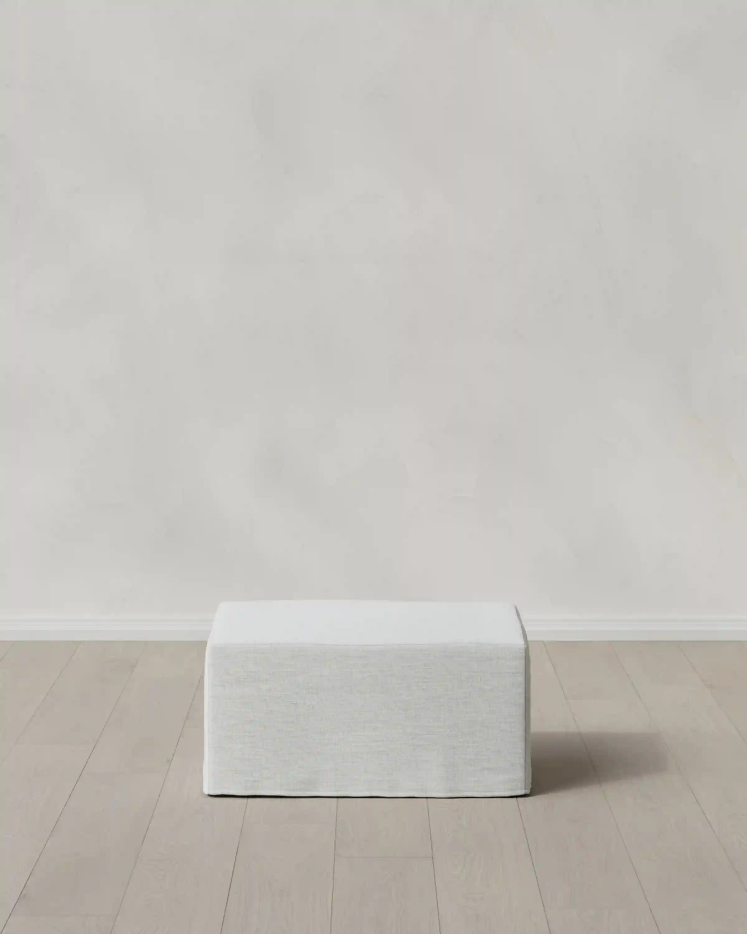 Ellery Slipcover Ottoman in Performance Linen