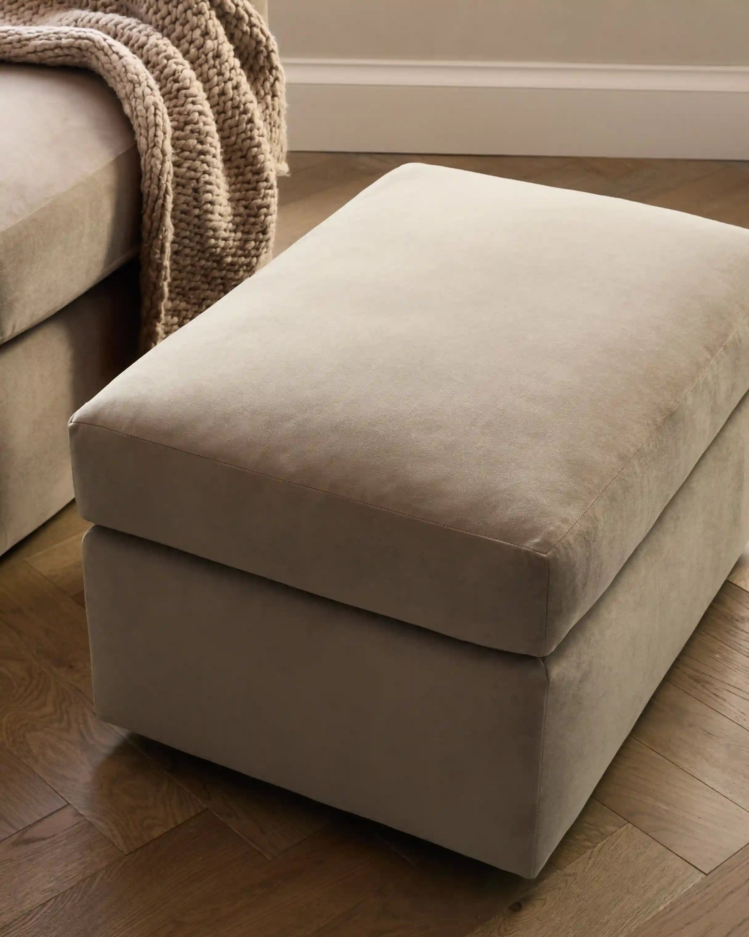 Brennan Ottoman in Performance Velvet