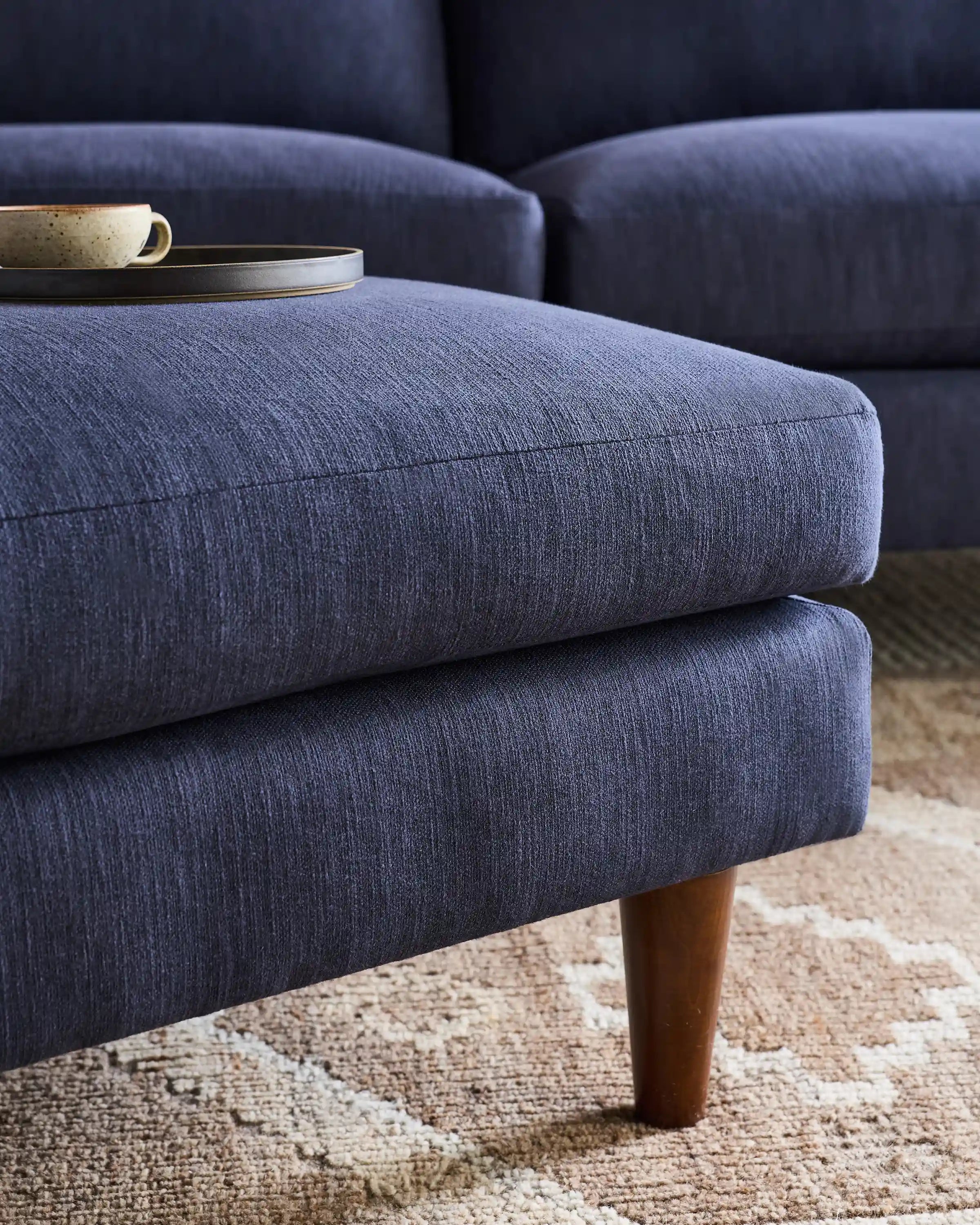Atlas Midcentury Ottoman in Performance Velvet