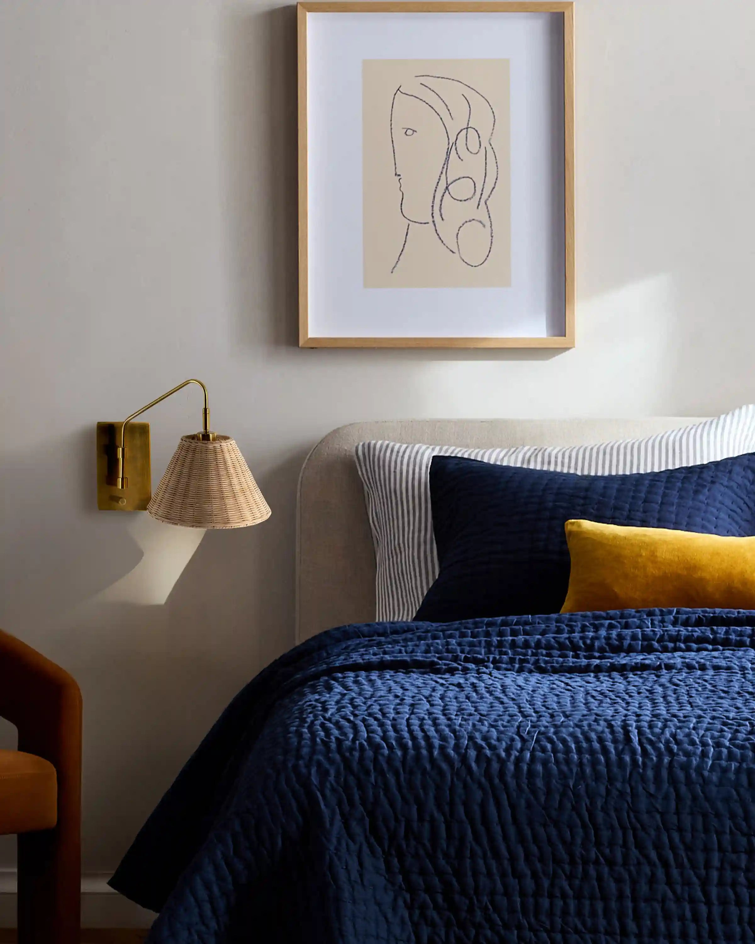 Articulating Sconce with Rattan Shade